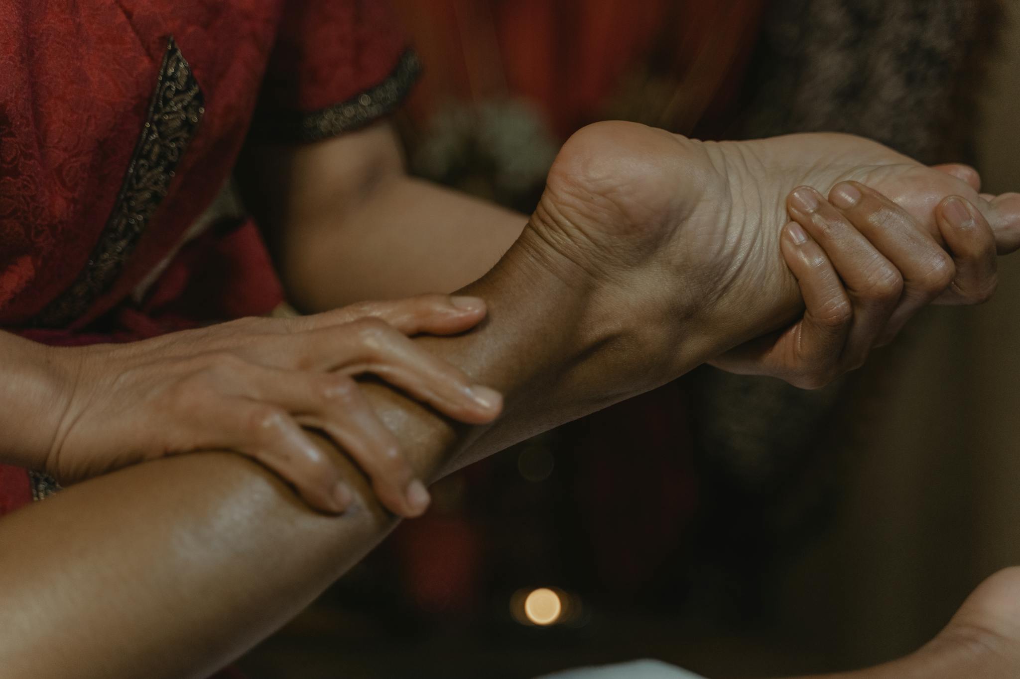 Close-up of a soothing foot massage at a spa, promoting relaxation and wellness.